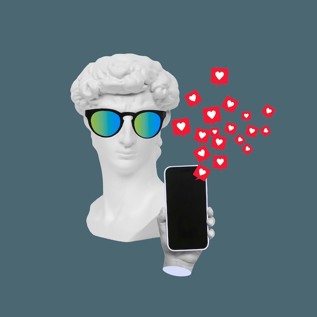 Antique statue's head in sunglasses holds mobile phone with social networks like symbols