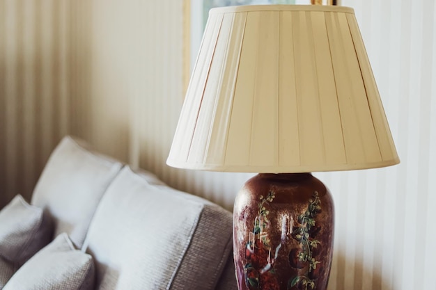 Antique table lamp in the classic English countryside interior decor
