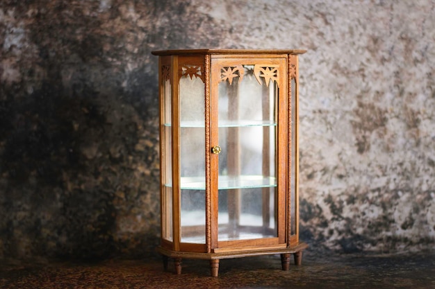 Antique wooden cabinet with mirror and drawers