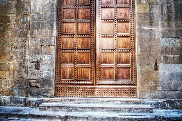 Antique wooden door in Florence Italy