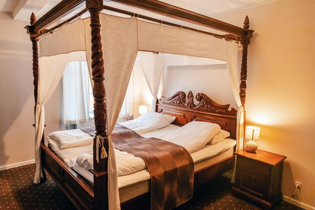 antique wooden four poster bed