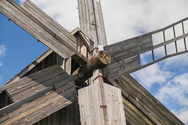 Antique wooden weathered windmill close-up. rural landscape