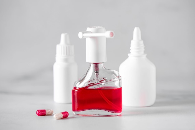 Antiseptic spray for sore throat in a glass vial