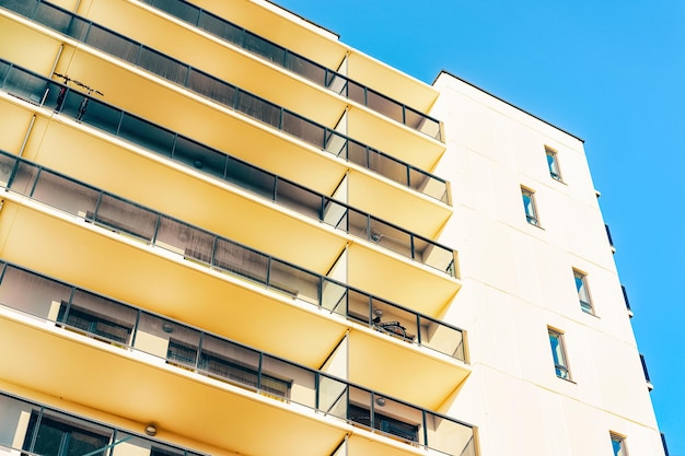 Apartment EU residential house facade and an blank copy space. Blue sky on the background.