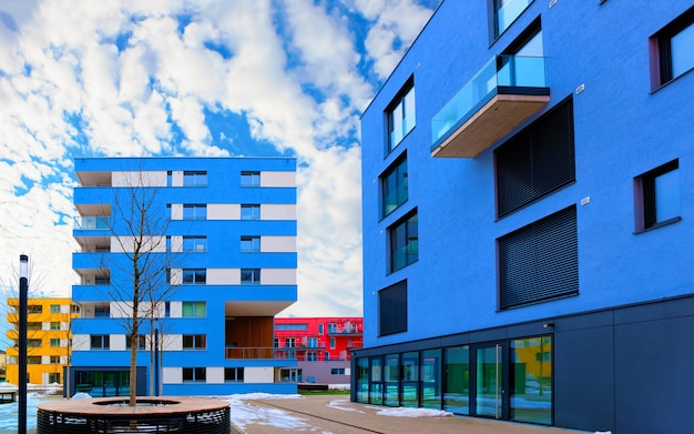 Apartment in residential building exterior. Housing structure at blue modern house of Europe. Rental home in city district on summer. Architecture for business property investment, Salzburg Austria.