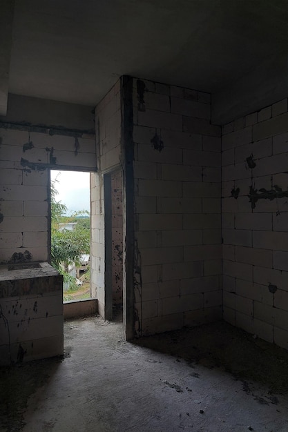 Apartment rooms while under construction whose cement is still visible