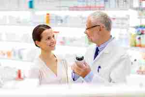 Photo apothecary and woman with drug at pharmacy