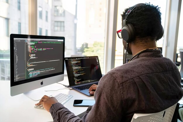 app developer testing mobile app on multiple devices coding software and testing tools