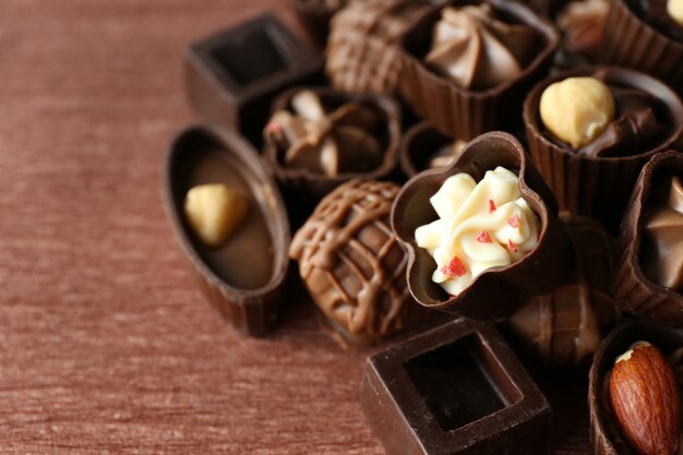 Appetizer chocolate candies on wooden