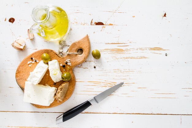 Photo appetizer - feta, olive, garlic, oil