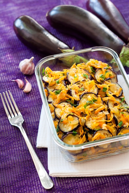 Appetizer of fried and marinated eggplant with onion and carrot