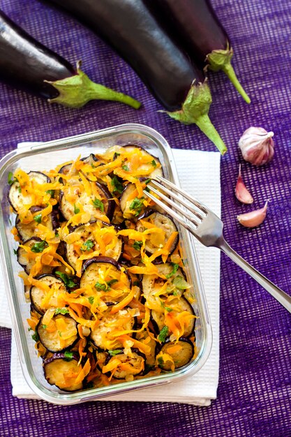 Appetizer of fried and marinated eggplant with onion and carrot