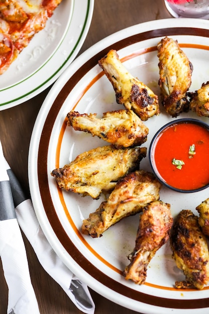 Appetizer plate with wood fired oven chicken wings.