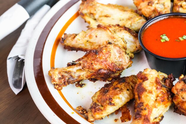 Appetizer plate with wood fired oven chicken wings.