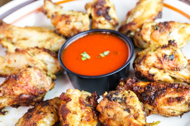 Appetizer plate with wood fired oven chicken wings.