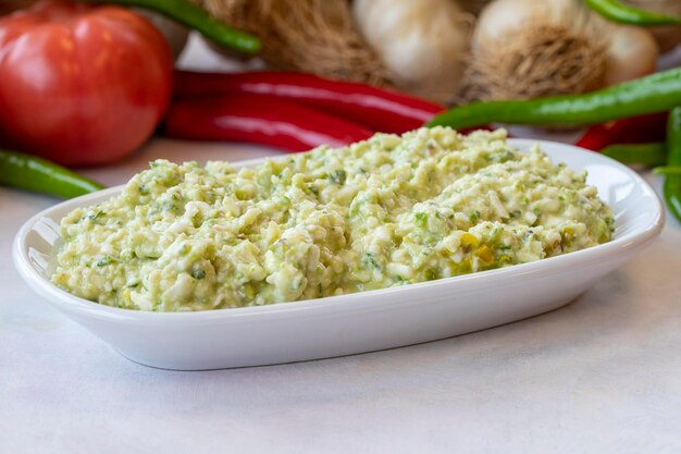 An appetizer prepared with feta cheese and pistachios Traditional Turkish and Arabic cuisine meze Snack meal served alongside the main course Natural vegetarian food Local name grit ezmesi mezze