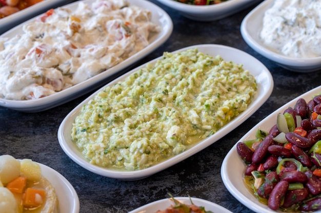 An appetizer prepared with feta cheese and pistachios Traditional Turkish and Arabic cuisine meze Snack meal served alongside the main course Natural vegetarian food Local name grit ezmesi mezze