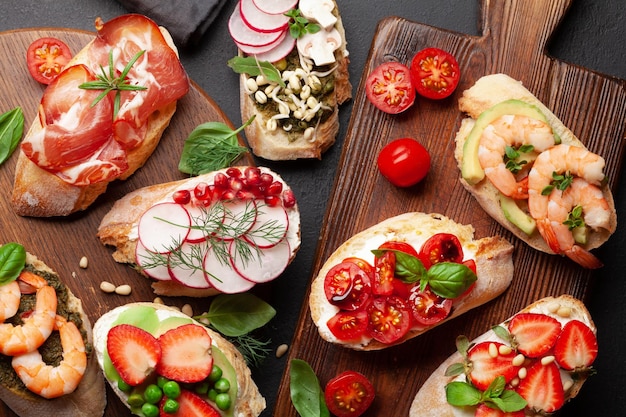 Appetizers board with traditional spanish tapas set Italian antipasti snacks