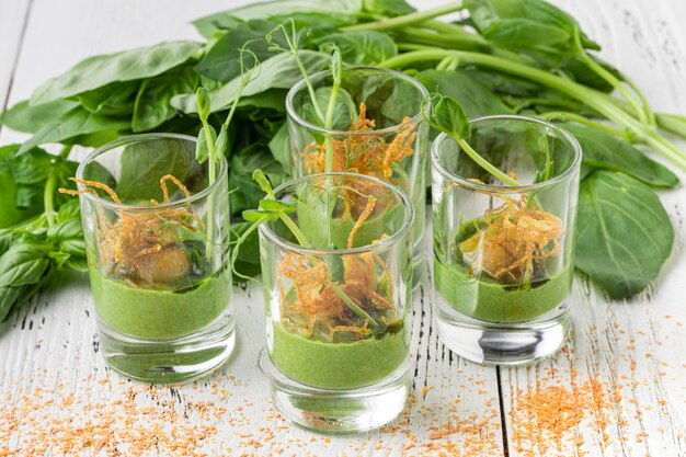 Appetizers made from herbs in glasses