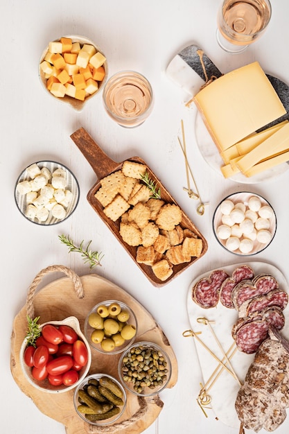Appetizers table with different antipasti charcuterie snacks cheese