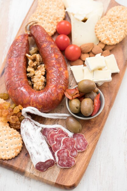 Appetizers on wooden board