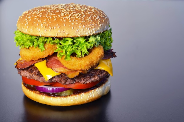 Appetizing burger on a black background 91