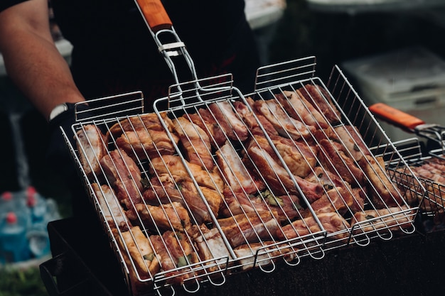 Appetizing fresh pork meat cooking on grill