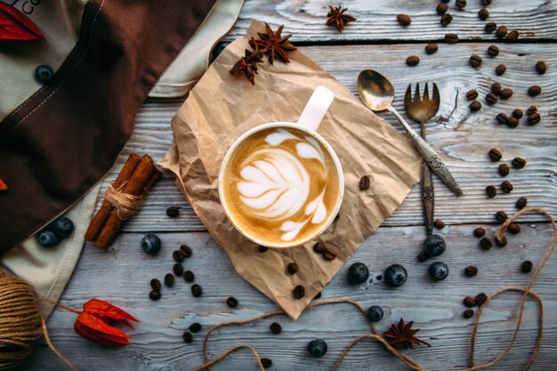 Appetizing sweet decorated coffee with milk