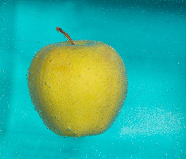 The Apple in the air bubbles on a blue background.