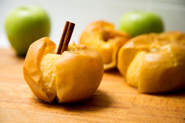 Apple baked in the oven with cinnamon aroma.