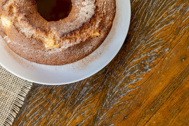 Apple cake, with brazil nuts, cinnamon and sugar. top view