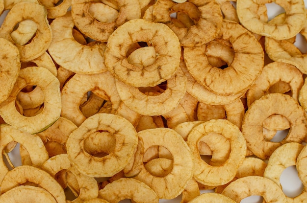 Apple chips background of dried fruits healthy and tasty food