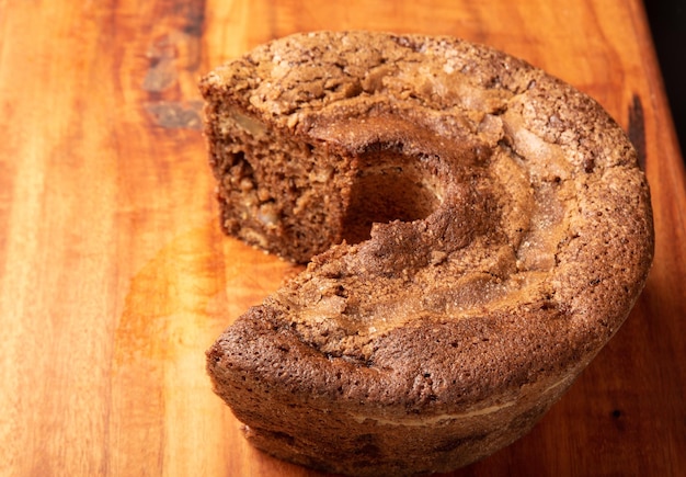 Apple and cinnamon cake on a rustic wooden surface selective focus