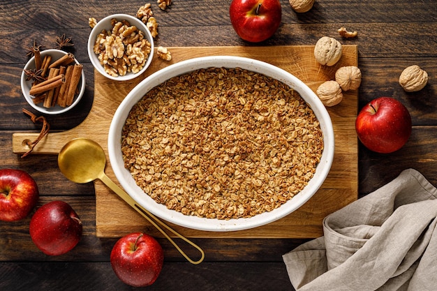 Apple crumble with oatmeal walnuts and cinnamon Top view