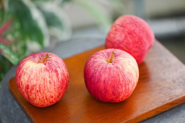 Apple fruit on the wooden table ripe red apples