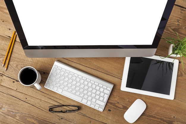 Apple iMac with the new iWatch displayed on the screen, image processed in black and white.