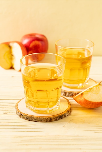 Apple juice with red apples fruits