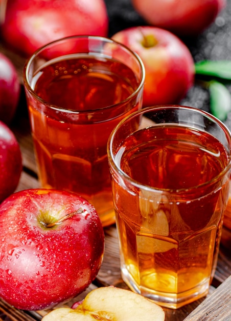Apple juice on a wooden tray