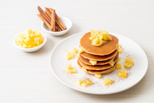 apple pancake or apple crepe with cinnamon powder