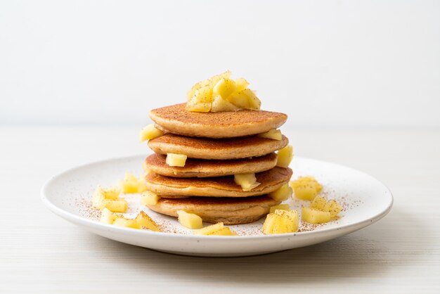 apple pancake or apple crepe with cinnamon powder