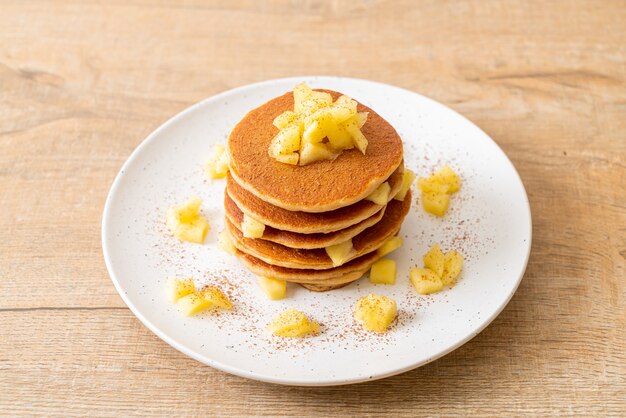 apple pancake or apple crepe with cinnamon powder