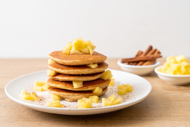 apple pancake or apple crepe with cinnamon powder