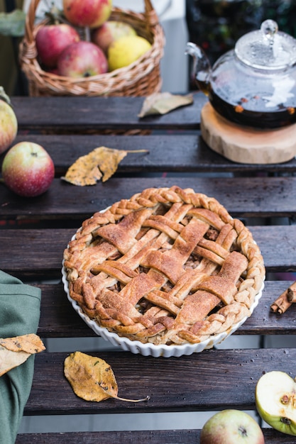 Apple pie and teapot with black tea, thanksgiving