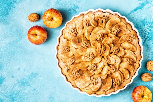 Apple pie with walnuts and cinnamon