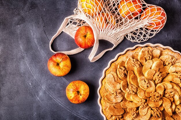 Apple pie with walnuts and cinnamon