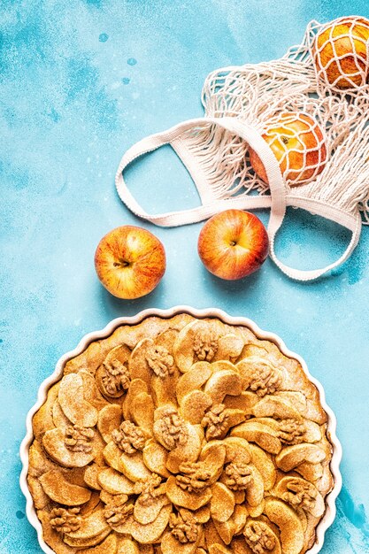 Apple pie with walnuts and cinnamon