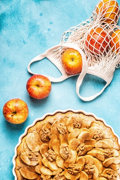 Apple pie with walnuts and cinnamon