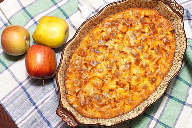 Apple pie on a wooden background selective focus