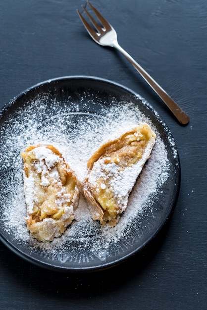 Apple strudel on the plate