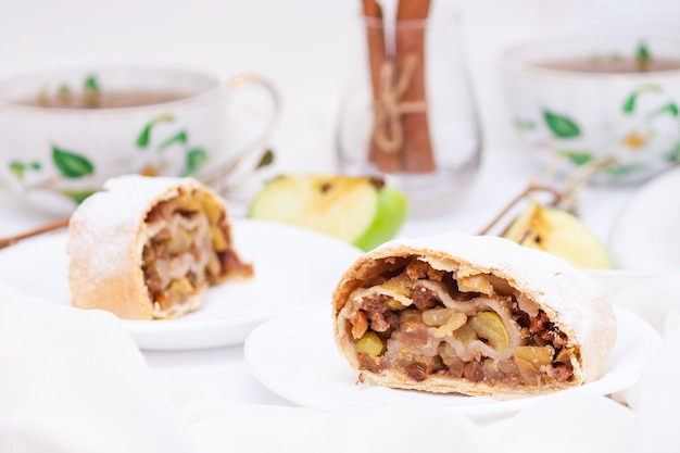 Apple strudel with cinnamon, nuts.